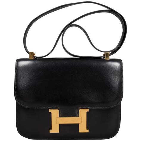 vintage black leather hermes bag with chain front|Hermes handbags for sale.